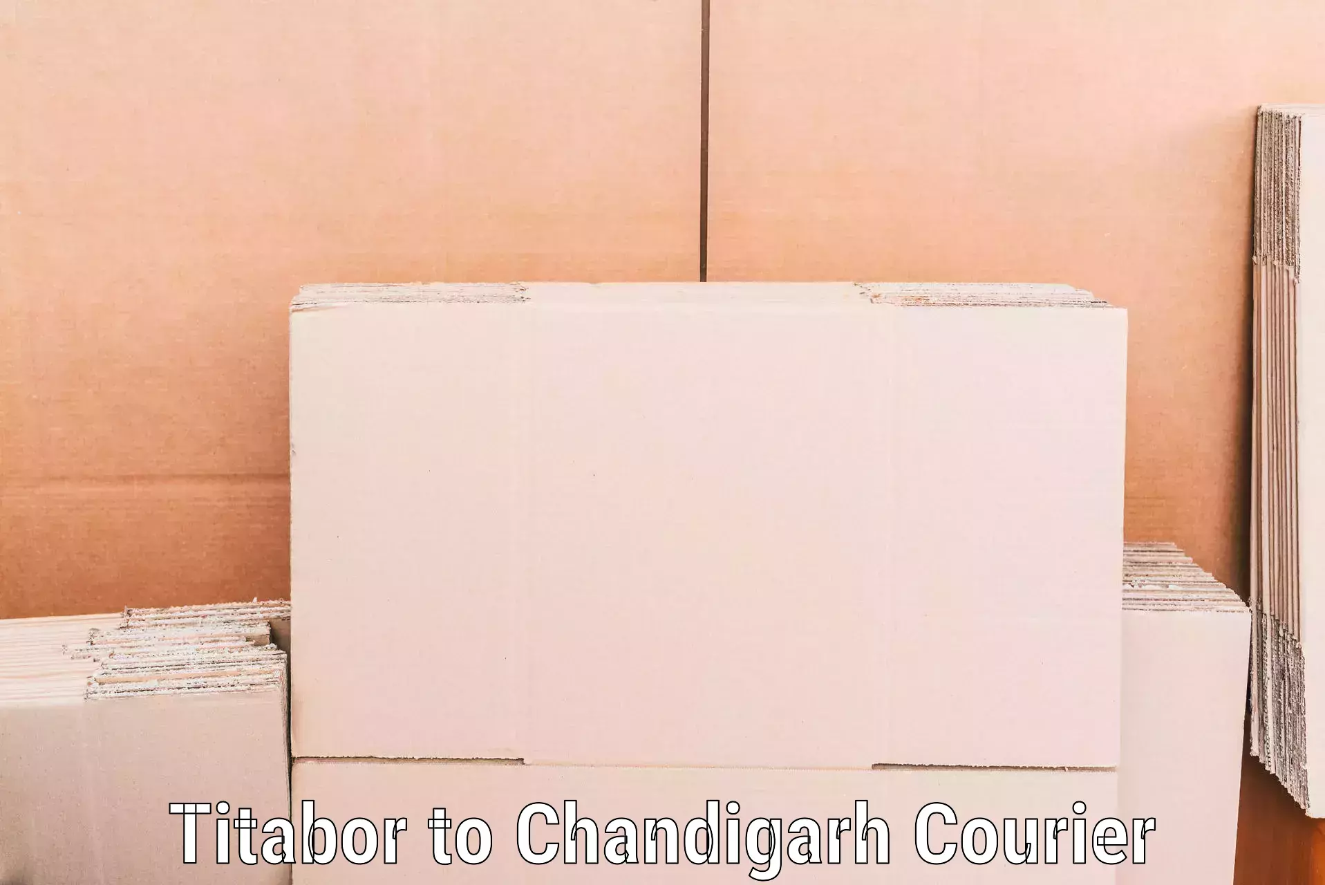 Quick home relocation services Titabor to Panjab University Chandigarh