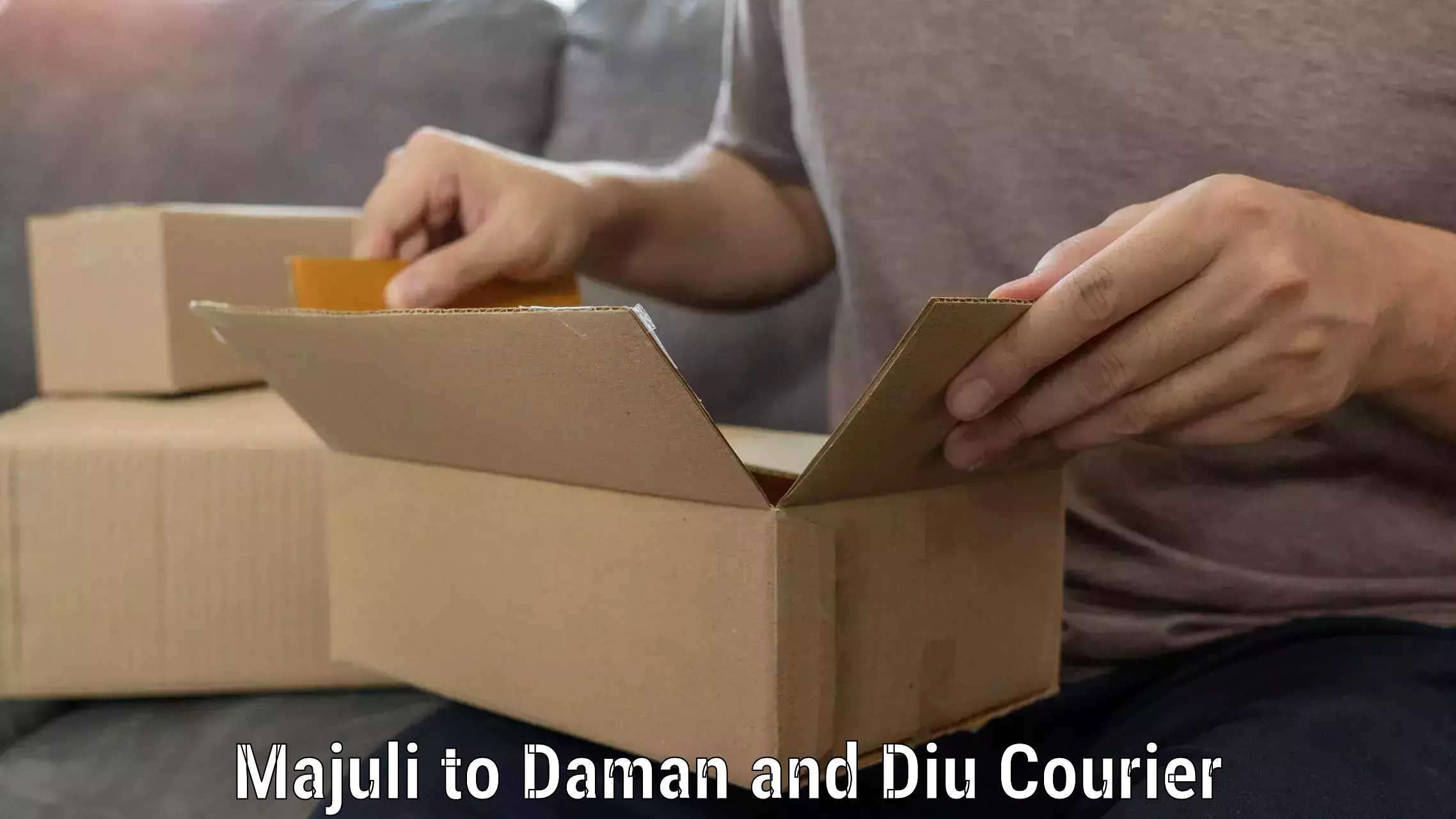 Reliable furniture shifting Majuli to Daman and Diu
