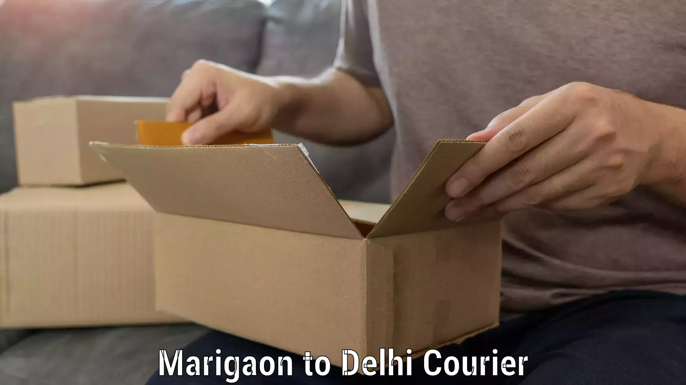 Moving and packing experts Marigaon to Ashok Vihar